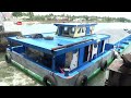 [641] Water hyacinth is a major obstacle for boats passing through the dam's gate