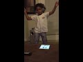 A too cute 4 year- old singing praise.