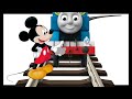 Mickey on a railway picking up stones