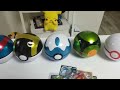 Opening a Pokemon card booster pack inside 6 types of Pokemon Pokeballs