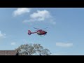 Air ambulance taking off from the local school grounds
