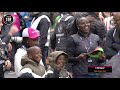 Eiud Kipchoge celebrates after running a sub 2 hour marathon