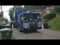 Republic Services Mack LEU Mcneilus M/A side loader on resi recycling route.