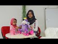 Maryam and Fatima are opening toyset from Zaky