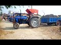 Powertrac Tractor High Lifting Stunt When Trolley Stuck in Mud || JCB Backhoe Machine Pushing Them