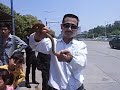 Man Holds His Chinese Snake