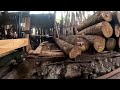 #the finishing process of production of large quality pine wood splitting