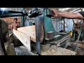 #process splitting large pine logs with full power